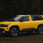“Tata Sierra 2025 electric SUV front view with LED light bar and modern muscular design.”